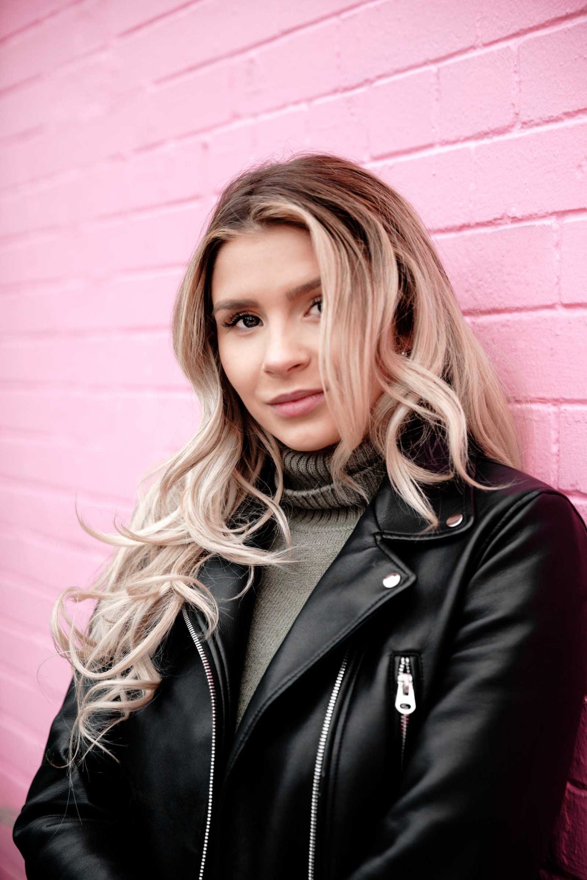 Relentless Power psychological thriller featuring a woman with long blonde hair in a black leather jacket and gray knit sweater